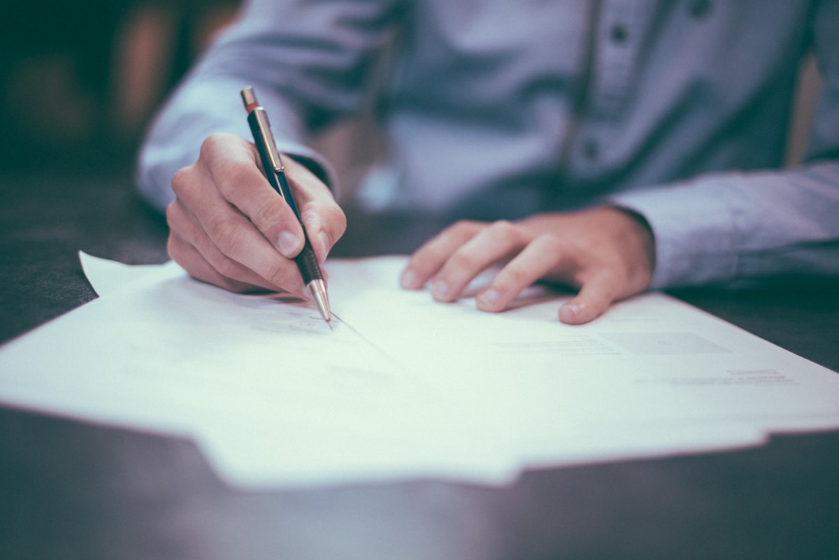 Business document being signed