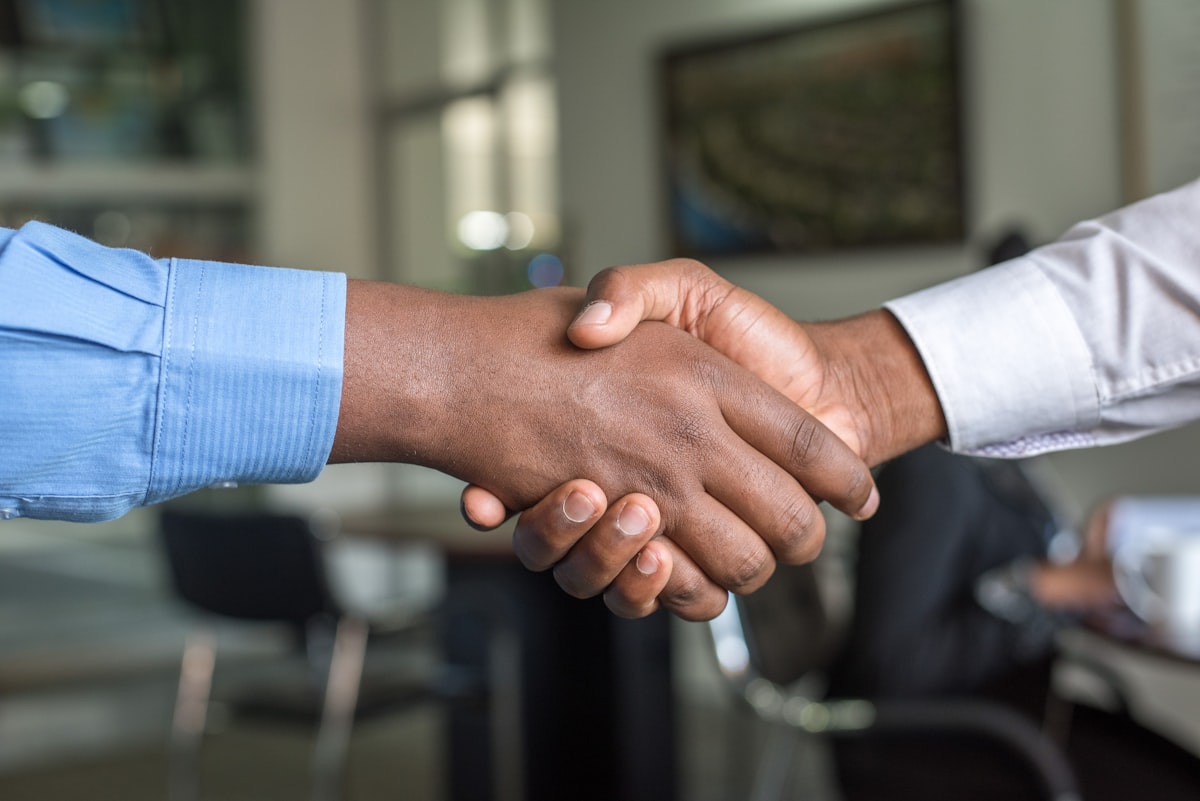 Professional handshake in an office